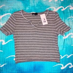 Gray and white striped essentials shirt